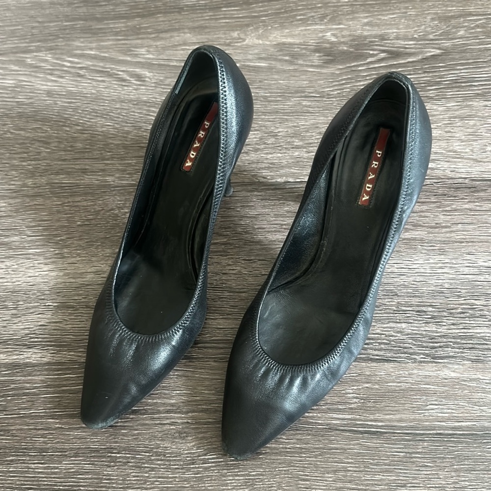 Prada black leather pumps